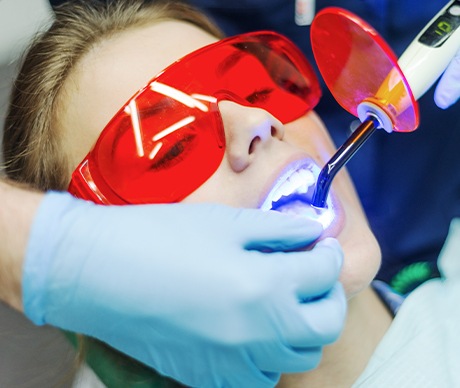 Patient receiving dental bonding