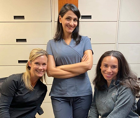 Three Pace Dental team members smiling