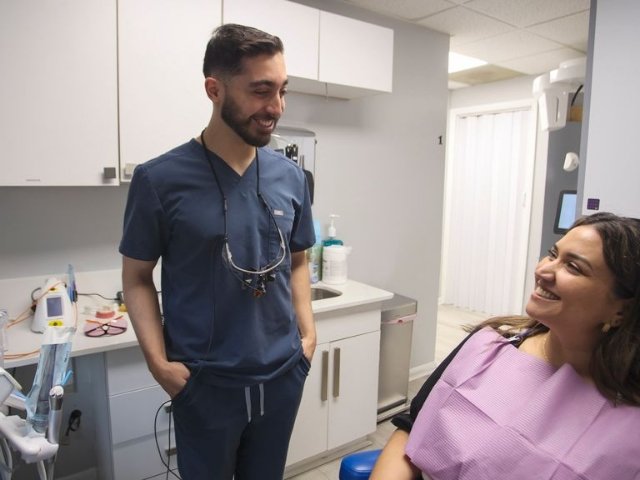 Vienna dentist and dental team members smiling outdoors