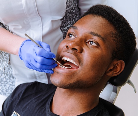 Man receiving dental checkup