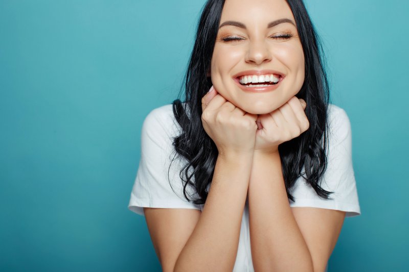 Woman after seeing cosmetic dentist