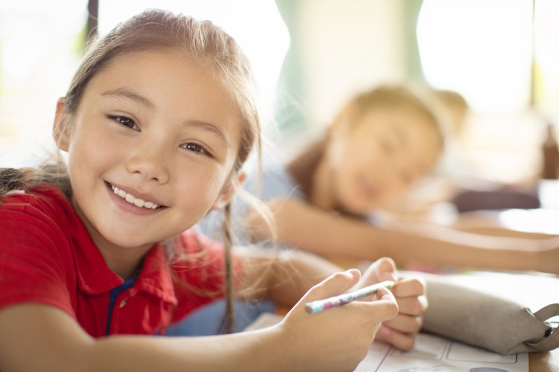 young girl in classroom