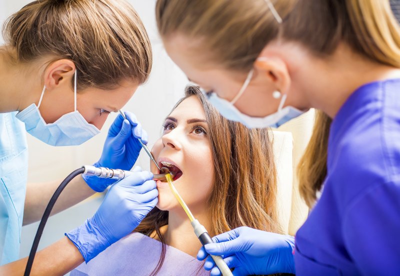 Woman undergoing dental treatment